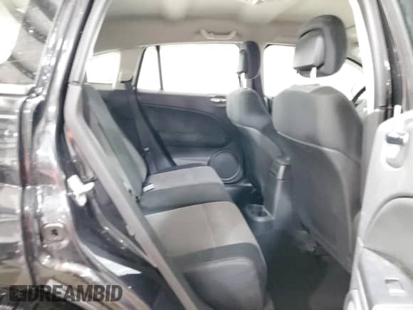 2010 Dodge Caliber SXT with VIN 1B3CB4HA0AD602517, listed as a Copart auction lot 85323475 with 40,840 mi miles and Salvage title. Bid and sale history available at DreamBid. Image 10.