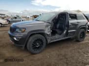 ✅ 2017 Jeep Grand Cherokee • VIN: 1C4HJFBG4HC728433 • Lot: 59215585. Listed on Copart with 143,085 mi. Free auction sales archive from the USA and detailed vehicle history report at DreamBid. Image 1.