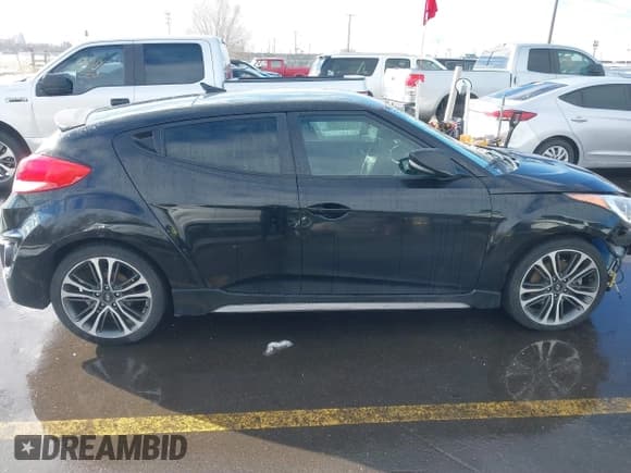 ✅ 2016 Hyundai Veloster Turbo Rally Edition • VIN: KMHTC6AE9GU255472 • Lot: 41583533. Wystawiony na IAAI z przebiegiem 138 094 mil. Bezpłatny archiwum sprzedaży aukcyjnych z USA i szczegółowy raport historii pojazdu na DreamBid. Zdjęcie 13.
