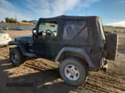 ✅ 2000 Jeep Wrangler Sport • VIN: 1J4FA49S9YP738234 • Lot: 91114555. Listed on Copart with 245,066 mi. Free auction sales archive from the USA and detailed vehicle history report at DreamBid. Image 2.