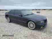 1998 BMW 3 Series M3s with VIN WBSCD9320WEE09027, listed as a Copart auction lot 52202055 with 244,452 mi miles and Clean title. Bid and sale history available at DreamBid. Image 4.