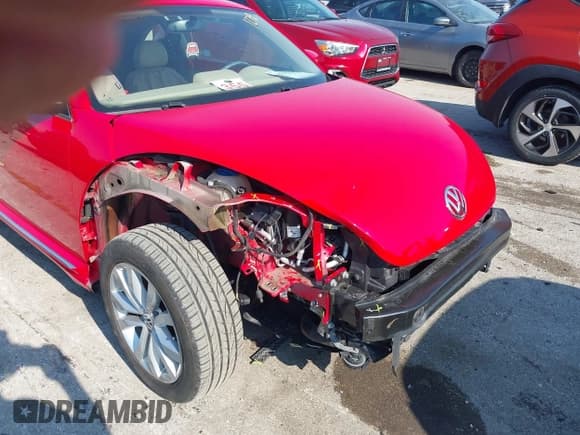 ✅ 2014 Volkswagen Beetle 2.0L TDI w/Sun/Sound/Nav • VIN: 3VWJL7AT6EM634671 • Лот: 42921278. Опубликован ранее на IAAI с пробегом 48 985 миль. Бесплатный доступ к архиву аукционных продаж из США и подробный отчёт об истории автомобиля на DreamBid. Изображение 6.