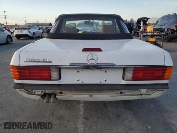 ✅ 1989 Mercedes-Benz 560 SL • VIN: WDBBA48D7KA100290 • Lot: 85049924. Listed on Copart with 88,919 mi. Free auction sales archive from the USA and detailed vehicle history report at DreamBid. Image 6.