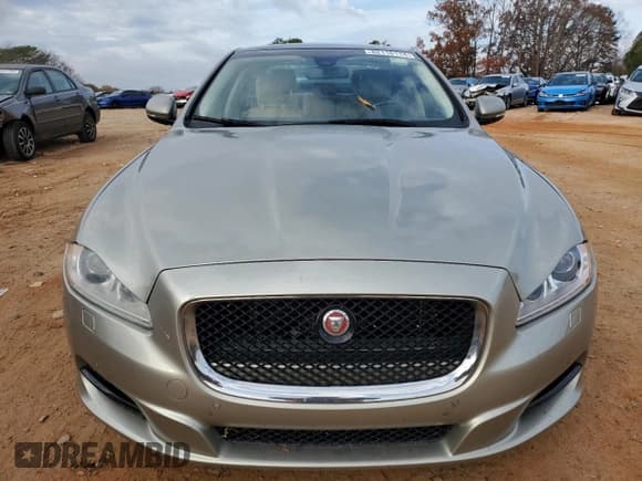 ✅ 2014 Jaguar XJ • VIN: SAJWA1CZ5E8V71971 • Лот: 82116114. Опубликован ранее на Copart с пробегом 127 164 миль. Бесплатный доступ к архиву аукционных продаж из США и подробный отчёт об истории автомобиля на DreamBid. Изображение 5.