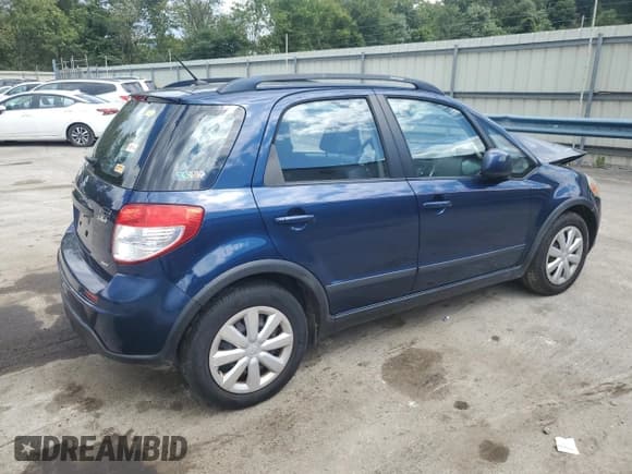 ✅ 2011 Suzuki SX4 Crossover • VIN: JS2YB5A33B6303959 • Лот: 70442045. Опубликован ранее на Copart с пробегом 76 263 миль. Бесплатный доступ к архиву аукционных продаж из США и подробный отчёт об истории автомобиля на DreamBid. Изображение 3.