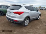 ✅ 2016 Hyundai Santa Fe • VIN: 5XYZWDLA9GG309133 • Lot: 43429006. Listed on IAAI with 125,931 mi. Free auction sales archive from the USA and detailed vehicle history report at DreamBid. Image 4.