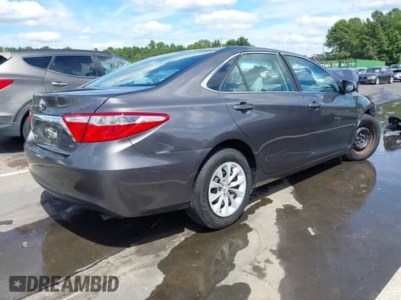 2015 Toyota Camry LE with VIN 4T4BF1FK4FR446399, listed as a IAAI auction lot 43128423 with 82,545 mi miles and . Bid and sale history available at DreamBid. Image 4.