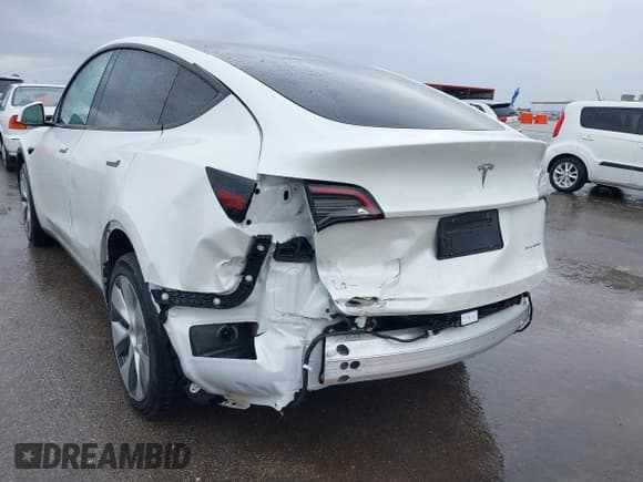 ✅ 2023 Tesla Model Y Long Range • VIN: 7SAYGDEE5PF712612 • Lot: 40392709. Listed on IAAI with 31,009 mi. Free auction sales archive from the USA and detailed vehicle history report at DreamBid. Image 6.