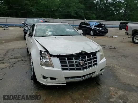 ✅ 2012 Cadillac CTS Performance • VIN: 1G6DJ1E36C0132095 • Лот: 57778905. Опубликован ранее на Copart с пробегом 144 143 миль. Бесплатный доступ к архиву аукционных продаж из США и подробный отчёт об истории автомобиля на DreamBid. Изображение 13.