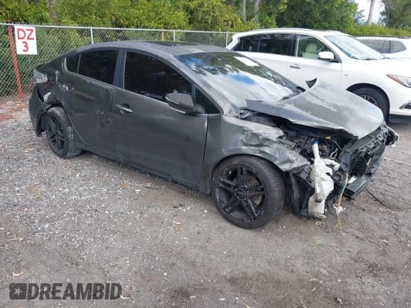 ✅ 2014 Kia Forte EX • VIN: KNAFZ4A82E5067377 • Lot: 43681276. Listed on IAAI with 113,087 mi. Free auction sales archive from the USA and detailed vehicle history report at DreamBid. Image 1.