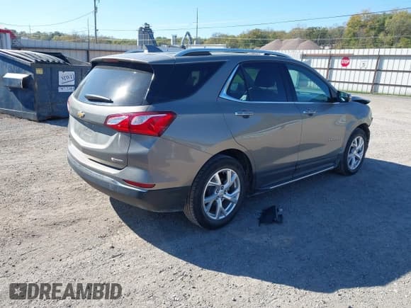 ✅ 2018 Chevrolet Equinox Premier • VIN: 3GNAXMEV9JS597694 • Lot: 43515511. Wystawiony na IAAI z przebiegiem 43 888 mil. Bezpłatny archiwum sprzedaży aukcyjnych z USA i szczegółowy raport historii pojazdu na DreamBid. Zdjęcie 4.