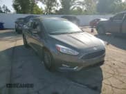 ✅ 2016 Ford Focus SE • VIN: 1FADP3FE8GL343588 • Lot: 71024185. Listed on Copart with 101,461 mi. Free auction sales archive from the USA and detailed vehicle history report at DreamBid. Image 13.