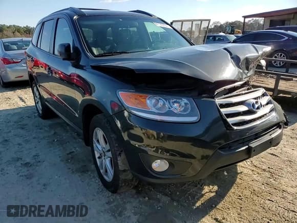 ✅ 2012 Hyundai Santa Fe Limited • VIN: 5XYZHDAG9CG159861 • Lot: 81720654. Listed on Copart with 188,181 mi. Free auction sales archive from the USA and detailed vehicle history report at DreamBid. Image 12.