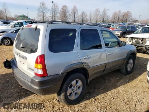 ✅ 2004 Mazda Tribute ES • VIN: 4F2CZ96194KM25993 • Lot: 49139564. Listed on Copart with 232,177 mi. Free auction sales archive from the USA and detailed vehicle history report at DreamBid. Image 3.