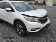 ✅ 2016 Honda CR-V Touring • VIN: 5J6RM4H91GL101783 • Lot: 82657945. Wystawiony na Copart z przebiegiem 98 451 mil. Bezpłatny archiwum sprzedaży aukcyjnych z USA i szczegółowy raport historii pojazdu na DreamBid. Zdjęcie 14.