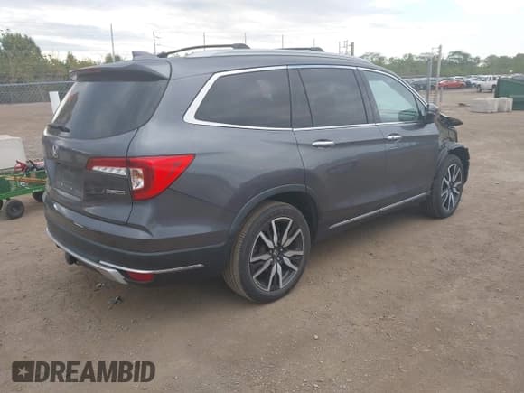 ✅ 2022 Honda Pilot Touring 7-Passenger • VIN: 5FNYF5H64NB000552 • Лот: 43450219. Опубликован ранее на IAAI с пробегом 84 697 миль. Бесплатный доступ к архиву аукционных продаж из США и подробный отчёт об истории автомобиля на DreamBid. Изображение 4.