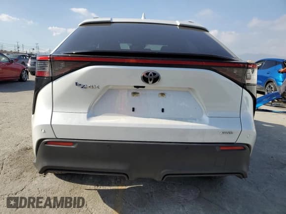 ✅ 2023 Toyota bZ4X XLE • VIN: JTMABABA8PA001119 • Lot: 82710595. Listed on Copart with 38,788 mi. Free auction sales archive from the USA and detailed vehicle history report at DreamBid. Image 6.