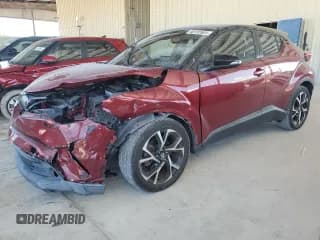✅ 2019 Toyota C-HR XLE • VIN: NMTKHMBX5KR081868 • Лот: 90102695. Опубликован ранее на Copart с пробегом 75 073 миль. Бесплатный доступ к архиву аукционных продаж из США и подробный отчёт об истории автомобиля на DreamBid. Изображение 1.