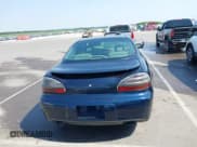 ✅ 2003 Pontiac Grand Prix GT • VIN: 1G2WP52K53F115653 • Lot: 42433273. Wystawiony na IAAI z przebiegiem 165 740 mil. Bezpłatny archiwum sprzedaży aukcyjnych z USA i szczegółowy raport historii pojazdu na DreamBid. Zdjęcie 16.