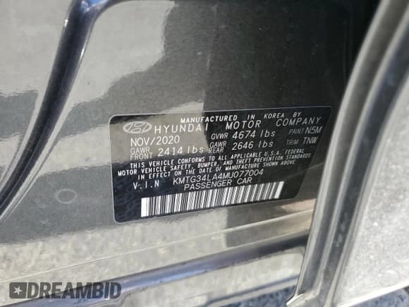 ✅ 2021 Genesis G70 2.0T • VIN: KMTG34LA4MU077004 • Lot: 71836194. Listed on Copart with 51,624 mi. Free auction sales archive from the USA and detailed vehicle history report at DreamBid. Image 12.