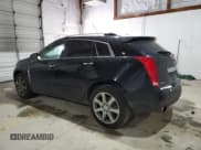 ✅ 2012 Cadillac SRX Premium Collection • VIN: 3GYFNFE31CS653641 • Lot: 38424094. Wystawiony na Copart z przebiegiem 100 677 mil. Bezpłatny archiwum sprzedaży aukcyjnych z USA i szczegółowy raport historii pojazdu na DreamBid. Zdjęcie 2.