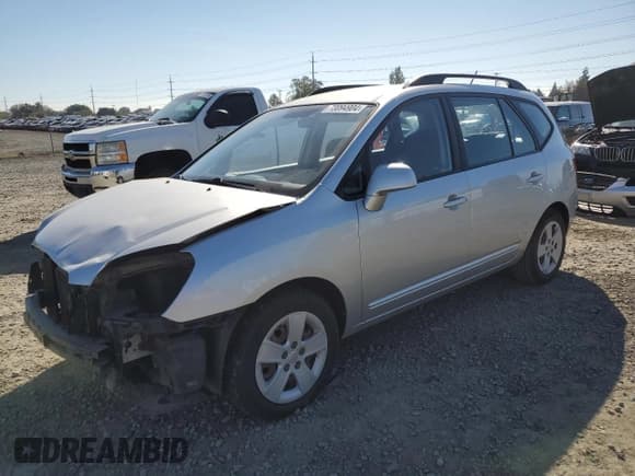 ✅ 2009 Kia Rondo LX • VIN: KNAFG528097261085 • Lot: 73094904. Listed on Copart with 95,287 mi. Free auction sales archive from the USA and detailed vehicle history report at DreamBid. Image 1.