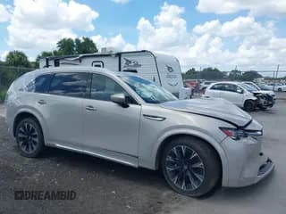 ✅ 2024 Mazda CX-90 S • VIN: JM3KK1HC0R1135680 • Lot: 42718291. Wystawiony na IAAI z przebiegiem 38 940 mil. Bezpłatny archiwum sprzedaży aukcyjnych z USA i szczegółowy raport historii pojazdu na DreamBid. Zdjęcie 1.
