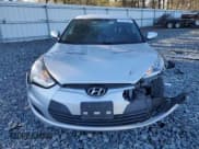 ✅ 2014 Hyundai Veloster • VIN: KMHTC6AD6EU203933 • Lot: 44615285. Wystawiony na Copart z przebiegiem 75 015 mil. Bezpłatny archiwum sprzedaży aukcyjnych z USA i szczegółowy raport historii pojazdu na DreamBid. Zdjęcie 5.