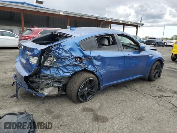 ✅ 2014 BMW X6 M • VIN: 5YMGZ0C53E0C40561 • Lot: 61092915. Wystawiony na Copart z przebiegiem Nie podano. Bezpłatny archiwum sprzedaży aukcyjnych z USA i szczegółowy raport historii pojazdu na DreamBid. Zdjęcie 3.