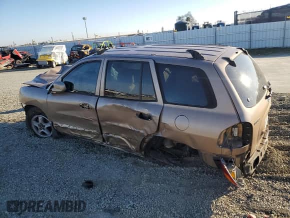 2002 Hyundai Santa Fe GLS z VIN KM8SC13D52U181981, wystawiony jako Copart lot #41909695 z przebiegiem Nie podano mil oraz Szkoda całkowita • Salvage title. Historia ofert i sprzedaży dostępna na DreamBid. Obrazek 2.