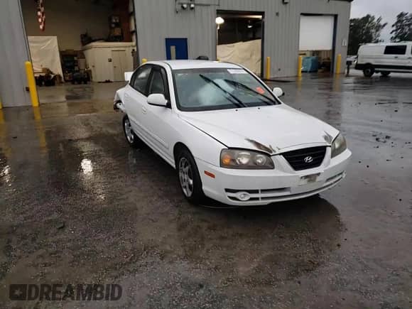 2006 Hyundai Elantra GLS с VIN KMHDN46D56U346935, выставлен на аукционе Copart как лот 71787674 с пробегом Не указан миль и Списание • Salvage title. История ставок и продаж доступна на DreamBid. Изображение 10.