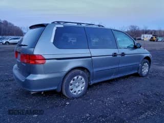 ✅ 1999 Honda Odyssey LX • VIN: 2HKRL1851XH516708 • Lot: 94859565. Listed on Copart with 110,256 mi. Free auction sales archive from the USA and detailed vehicle history report at DreamBid. Image 3.