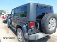 ✅ 2008 Jeep Wrangler Unlimited Sahara • VIN: 1J4GA59138L640048 • Lot: 42594778. Listed on IAAI with 114,332 mi. Free auction sales archive from the USA and detailed vehicle history report at DreamBid. Image 3.