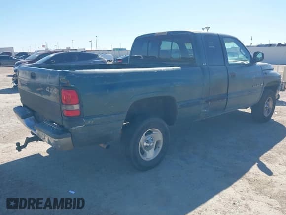 ✅ 1999 Dodge 1500 • VIN: 3B7HF13Z9XG137736 • Lot: 43598077. Listed on IAAI with 200,659 mi. Free auction sales archive from the USA and detailed vehicle history report at DreamBid. Image 4.