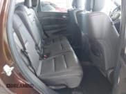 ✅ 2015 Jeep Grand Cherokee Summit • VIN: 1C4RJEJG2FC829205 • Lot: 43469676. Listed on IAAI with 89,893 mi. Free auction sales archive from the USA and detailed vehicle history report at DreamBid. Image 8.