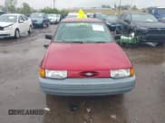 ✅ 1995 Ford Escort • VIN: 1FASP11J5SW107553 • Lot: 42202877. Listed on IAAI with 76,751 mi. Free auction sales archive from the USA and detailed vehicle history report at DreamBid. Image 12.