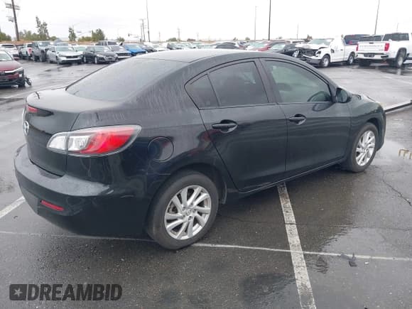 ✅ 2012 Mazda 3 i Touring • VIN: JM1BL1VG5C1506157 • Lot: 41629654. Listed on IAAI with 144,475 mi. Free auction sales archive from the USA and detailed vehicle history report at DreamBid. Image 4.