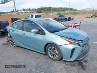2021 Toyota Prius L Eco with VIN JTDKAMFU6M3127489, listed as a IAAI auction lot 42046658 with 126,249 mi miles and . Bid and sale history available at DreamBid. Image 1.