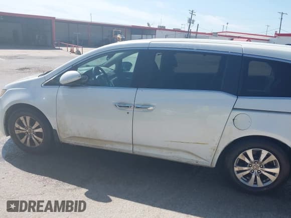 ✅ 2014 Honda Odyssey EX-L • VIN: 5FNRL5H61EB001509 • Lot: 42371539. Listed on IAAI with 259,195 mi. Free auction sales archive from the USA and detailed vehicle history report at DreamBid. Image 14.