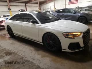 ✅ 2023 Audi S8 • VIN: WAULSAF87PN008715 • Лот: 52538485. Опубликован ранее на Copart с пробегом Не указан. Бесплатный доступ к архиву аукционных продаж из США и подробный отчёт об истории автомобиля на DreamBid. Изображение 4.
