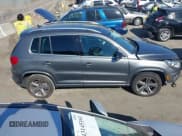 ✅ 2017 Volkswagen Tiguan Sport • VIN: WVGTV7AX2HK029255 • Lot: 43156210. Listed on IAAI with 86,004 mi. Free auction sales archive from the USA and detailed vehicle history report at DreamBid. Image 14.