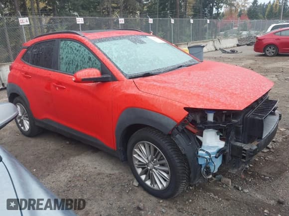 ✅ 2019 Hyundai Kona SEL • VIN: KM8K6CAAXKU334317 • Лот: 43562552. Опубликован ранее на IAAI с пробегом 59 192 миль. Бесплатный доступ к архиву аукционных продаж из США и подробный отчёт об истории автомобиля на DreamBid. Изображение 1.