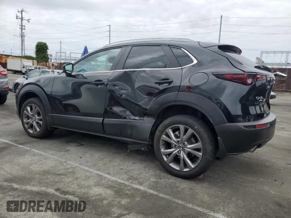 ✅ 2024 Mazda CX-30 S Carbon Edition • VIN: 3MVDMBCM1RM618954 • Lot: 53690825. Listed on Copart with 16,776 mi. Free auction sales archive from the USA and detailed vehicle history report at DreamBid. Image 2.