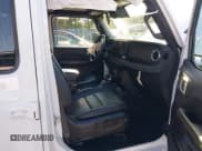 ✅ 2024 Jeep Wrangler Sahara • VIN: 1C4RJXP69RW231206 • Lot: 43353017. Listed on IAAI with 25,555 mi. Free auction sales archive from the USA and detailed vehicle history report at DreamBid. Image 5.