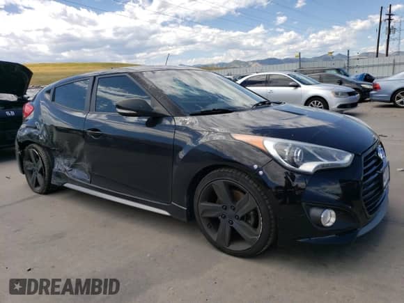2014 Hyundai Veloster Turbo с VIN KMHTC6AE3EU189109, выставлен на аукционе Copart как лот 67153984 с пробегом 77 979 миль миль и Списание • Salvage title. История ставок и продаж доступна на DreamBid. Изображение 4.