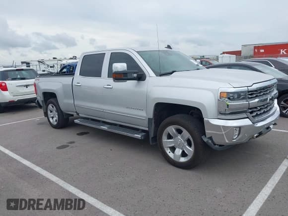 ✅ 2018 Chevrolet Silverado 1500 LTZ • VIN: 3GCUKSEJ6JG433893 • Лот: 42812872. Опубликован ранее на IAAI с пробегом 101 509 миль. Бесплатный доступ к архиву аукционных продаж из США и подробный отчёт об истории автомобиля на DreamBid. Изображение 1.