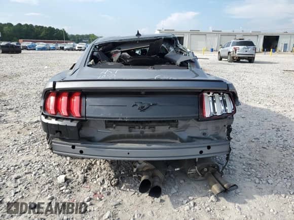 2022 Ford Mustang EcoBoost z VIN 1FA6P8TH9N5133197, wystawiony jako Copart lot #69819205 z przebiegiem 34 497 mil mil oraz Szkoda całkowita • Salvage title. Historia ofert i sprzedaży dostępna na DreamBid. Obrazek 6.