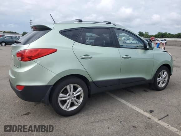 2011 Hyundai Tucson Limited z VIN KM8JU3ACXBU242367, wystawiony jako Copart lot #63461064 z przebiegiem 68 341 mil mil oraz Szkoda całkowita • Salvage title. Historia ofert i sprzedaży dostępna na DreamBid. Obrazek 3.