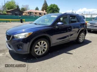 ✅ 2013 Mazda CX-5 Grand Touring • VIN: JM3KE4DE9D0162424 • Lot: 62534605. Listed on Copart with 115,112 mi. Free auction sales archive from the USA and detailed vehicle history report at DreamBid. Image 1.