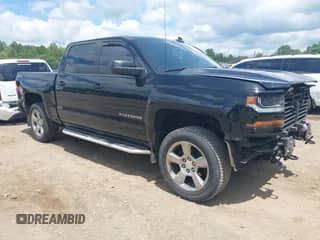 2017 Chevrolet Silverado 1500 LT with VIN 3GCUKREC6HG301978, listed as a IAAI auction lot 42230716 with 96,860 mi miles and . Bid and sale history available at DreamBid. Image 1.